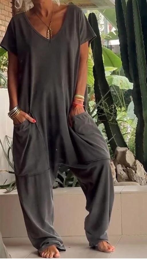 Women's comfortable oversized jumpsuit with V-neck, deep crotch and inset pockets Mune Fashion
