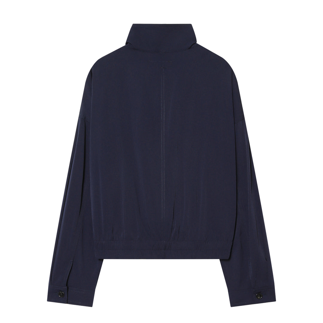 Women's short utility blouson jacket with standing collar, patch chest pockets, full zip, and elastic hem Mune Fashion