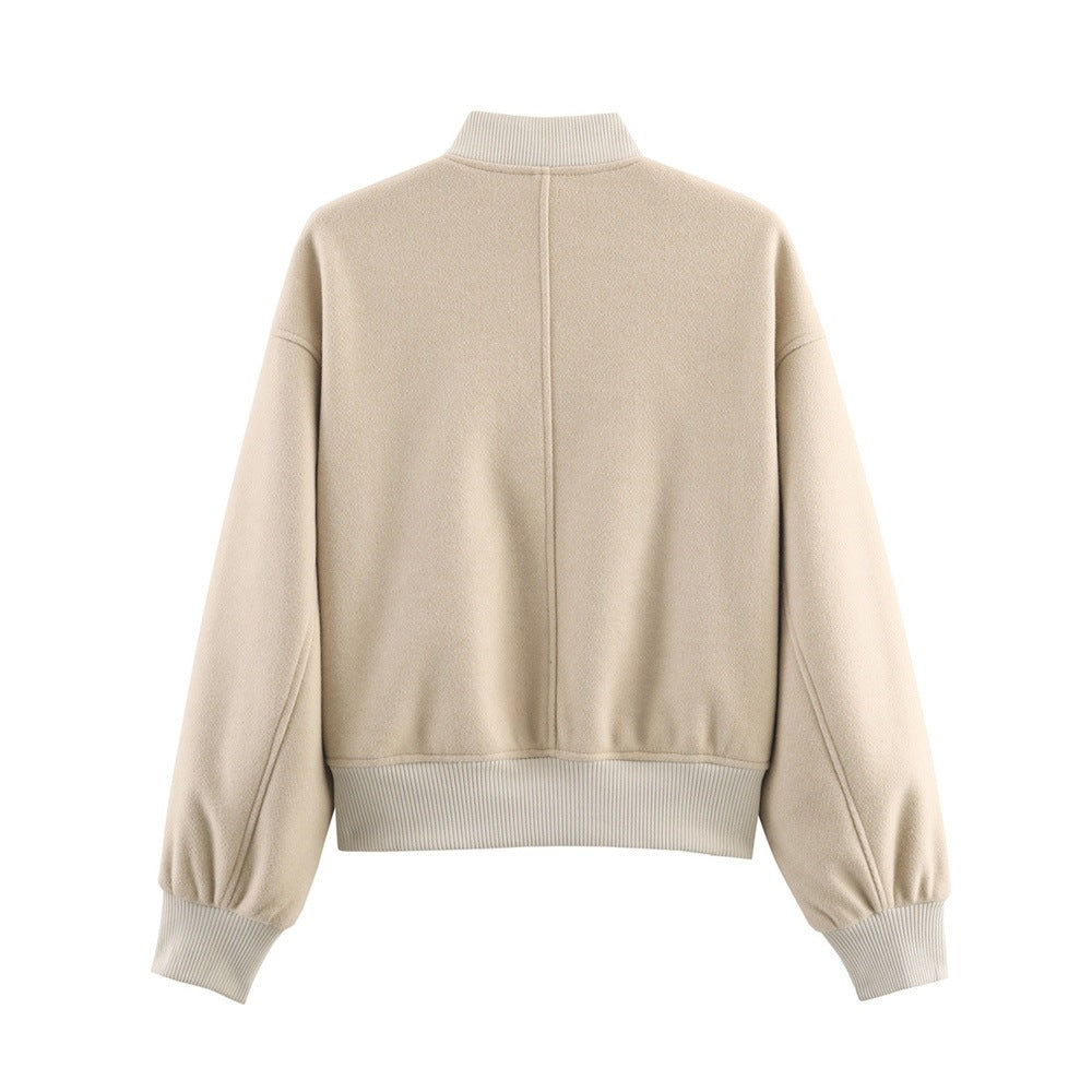 Ladies short boxy bomber jacket with ribbed collar, snap button closure, and pockets Mune Fashion