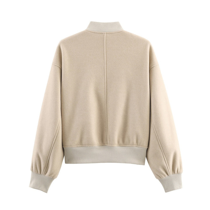 Ladies short boxy bomber jacket with ribbed collar, snap button closure, and pockets Mune Fashion