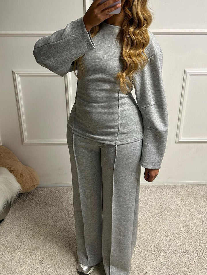 Women's soft lounge set with fitted sweatshirt, sculpting seam details, and wide palazzo pants leg Mune Fashion