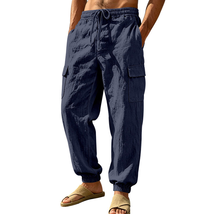 Men's lightweight cargo jogger pants made of linen blend with elastic drawstring waistband, patch flap pockets, and ribbed leg cuffs Mune Fashion