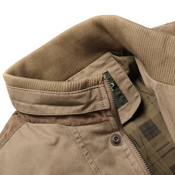 Men's canvas transition jacket with ribbed collar, concealed zipper, and checkered lining Mune Fashion