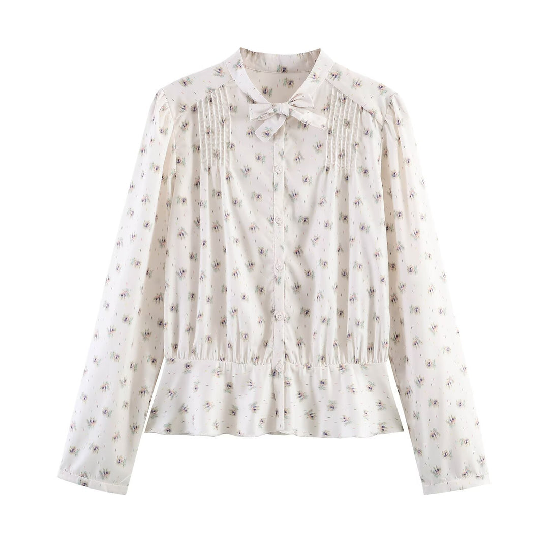Women's chiffon blouse with bow collar, chest pintucks and peplum Mune Fashion