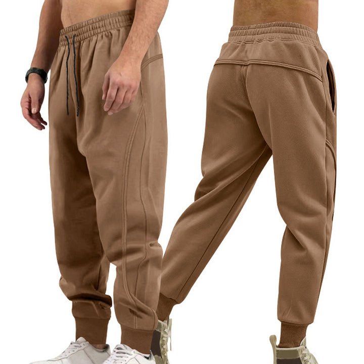 Men's versatile sweat jogging pants with ergonomic knee inserts, elastic comfort waistband, and concealed zip pockets Mune Fashion