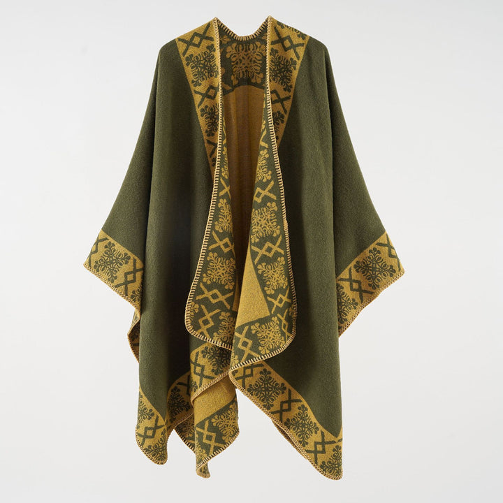 Women's oversized poncho cape made of wool blend with woven border jacquard and decorative chain stitch