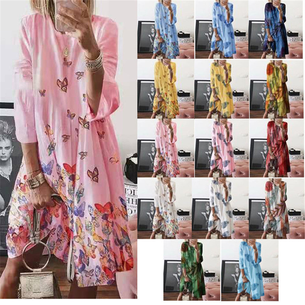 Women's airy midi dress with palm print, half-length sleeves and A-line cut Mune Fashion