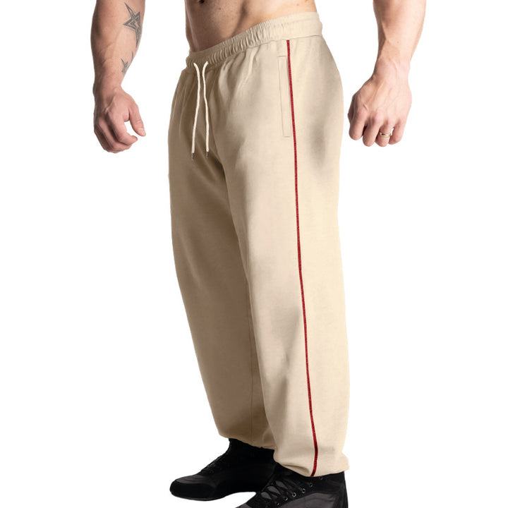 Men's casual jogging pants with elastic drawstring waistband, subtle side stripe, and deep side pockets Mune Fashion