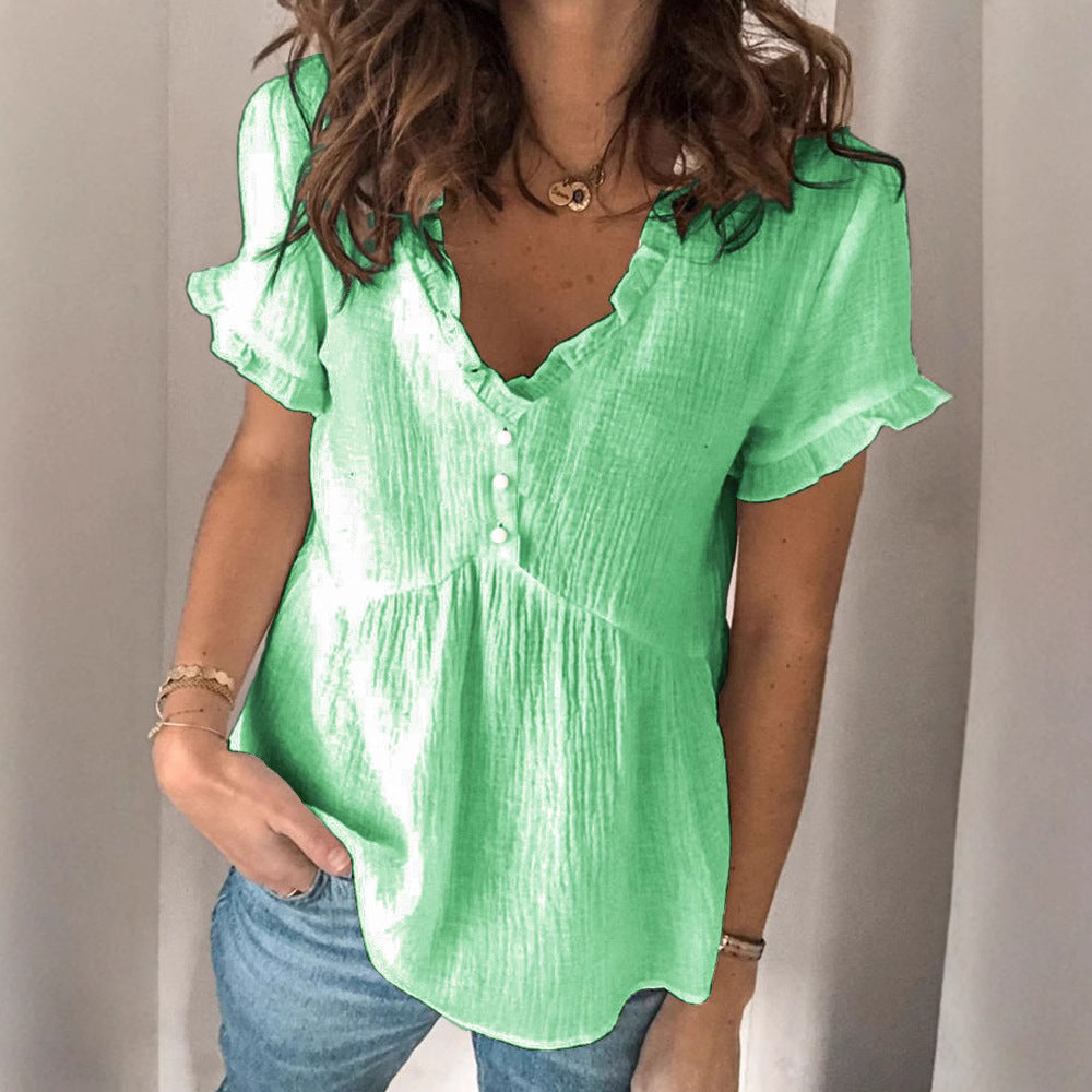 Ladies V-neck blouse with ruffle details and button closure Mune Fashion