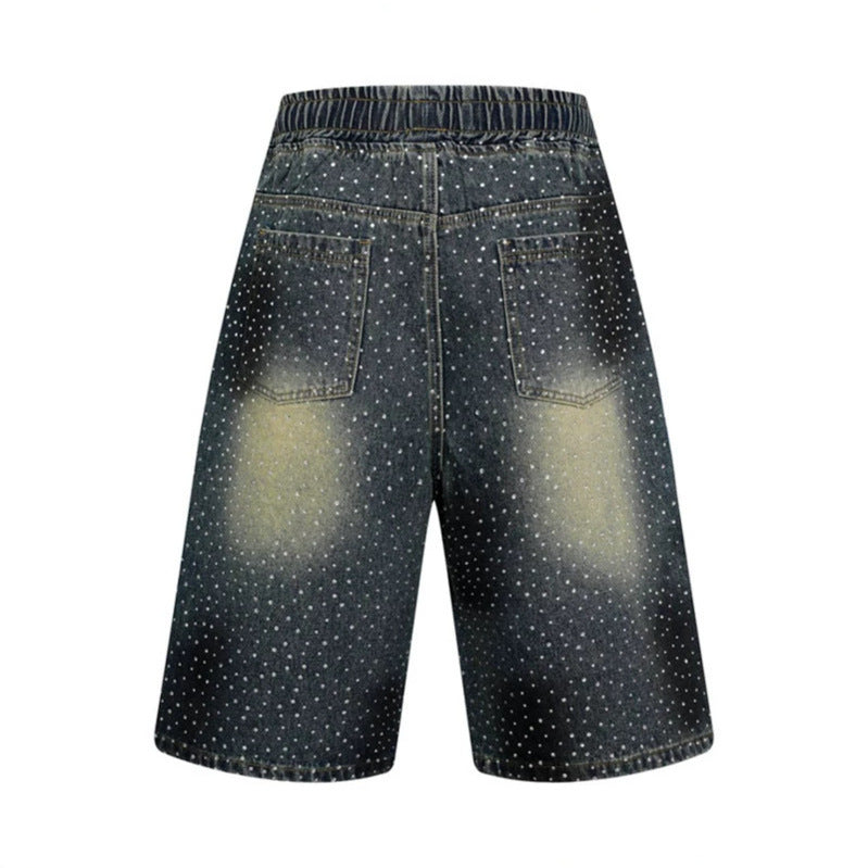 Women's high-waisted denim culotte shorts with comfort waistband and subtle polka dot pattern Mune Fashion