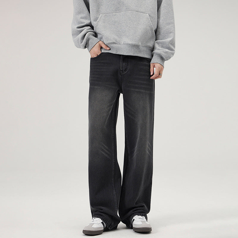 Men's baggy jeans with a low crotch, washed vintage denim, and straight leg Mune Fashion