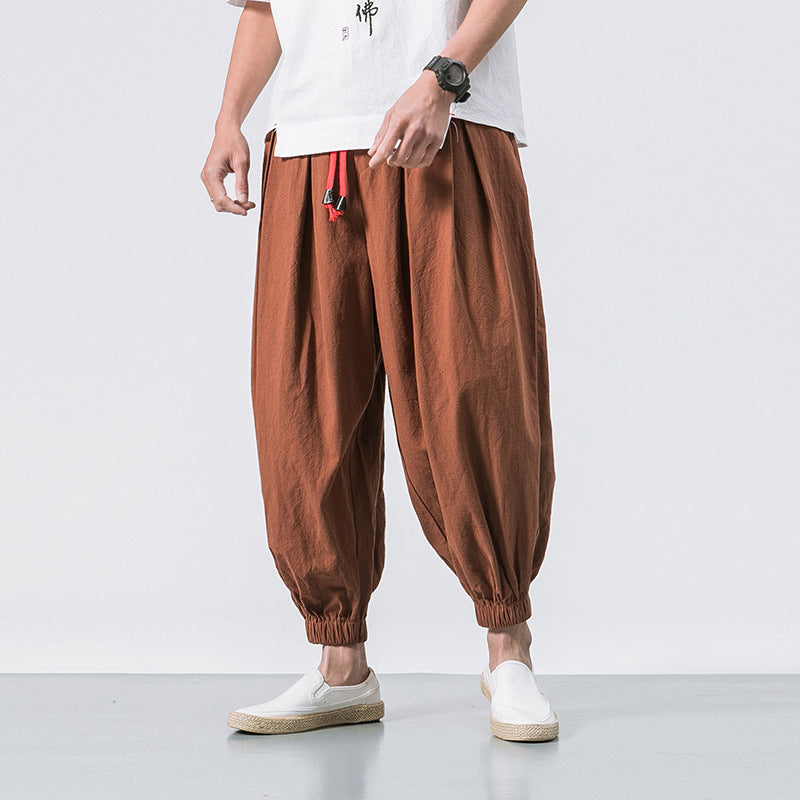 Men's unusual harem-style balloon pants with pleats, elastic waistband, and drawstring Mune Fashion