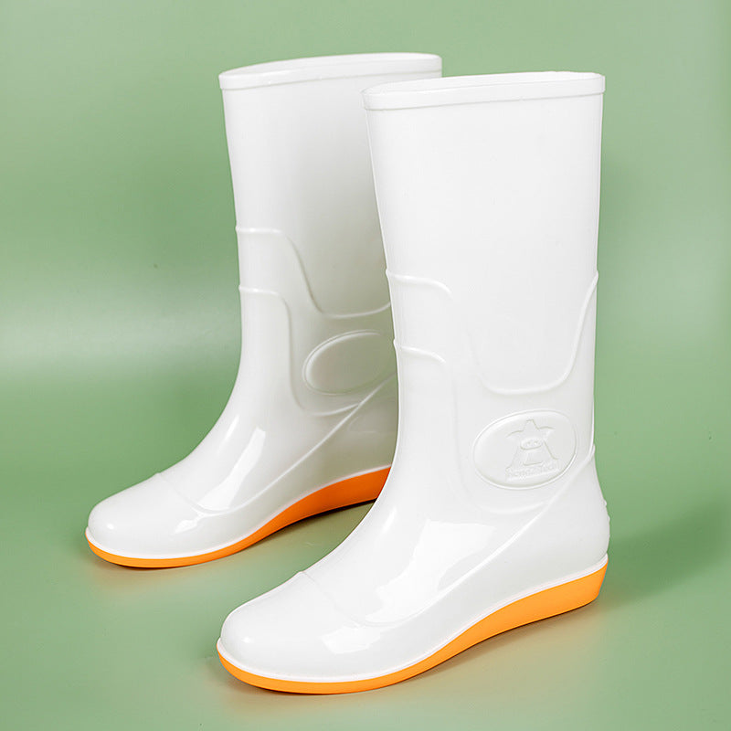 Women Shiny mid-height rain boots made of PVC with a lightweight wedge heel Mune Fashion