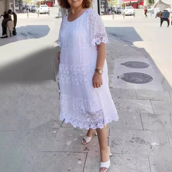 Women's midi dress with lace tiers, pleated inserts and short trumpet sleeves Mune Fashion