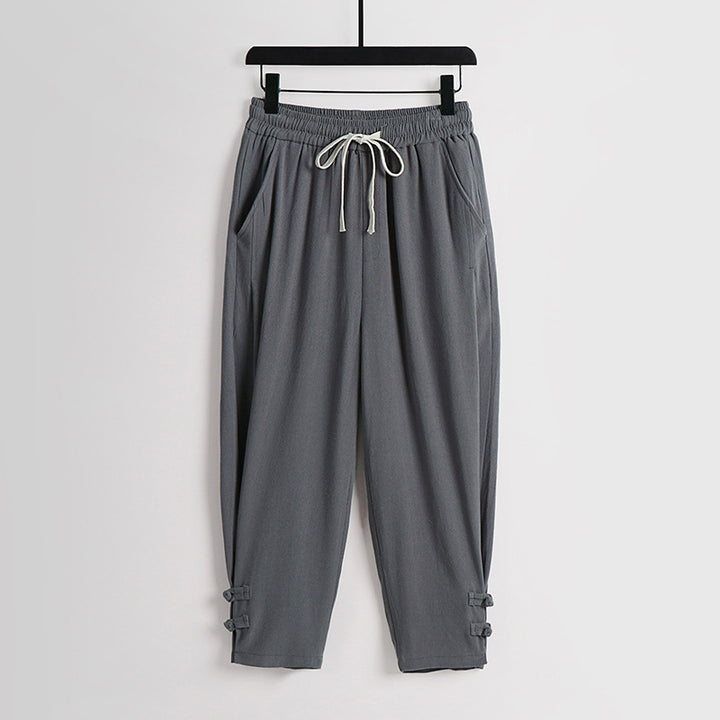 Women's casual jogging pants with drawstring and decorative buttons at the ankle Mune Fashion