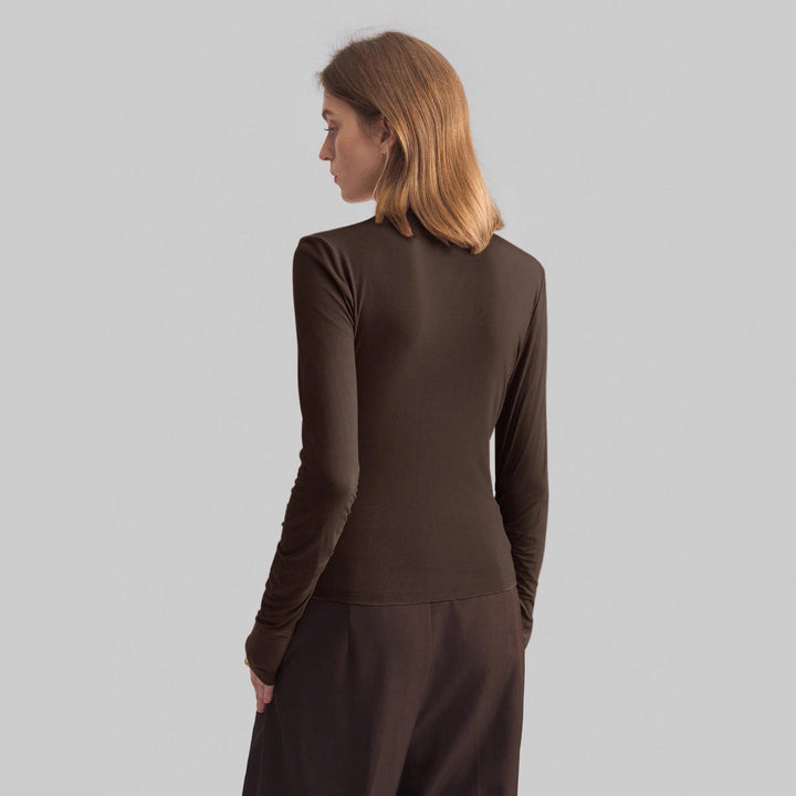 Women’s narrow cut long sleeve shirt with asymmetric draping and side gathering Mune Fashion