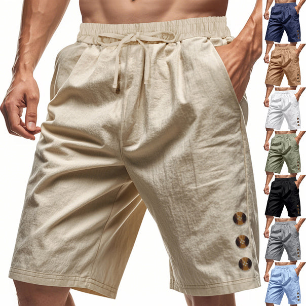 Men's knee-length casual Bermuda shorts with elastic tunnel drawstring waist, side slit pockets, and round decorative appliqués Mune Fashion