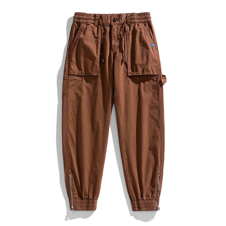 Men's workwear cargo pants in tech jogger style with applied front pockets, hammer loop, and ankle zippers Drune