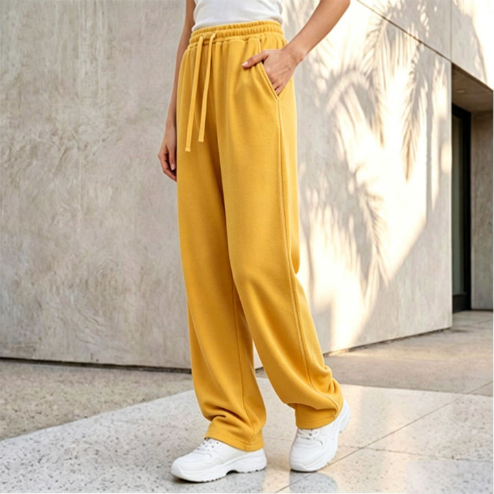 Women's wide lounge palazzo pants with high comfort waistband, drawstring, side pockets, and decorative side seam Mune Fashion