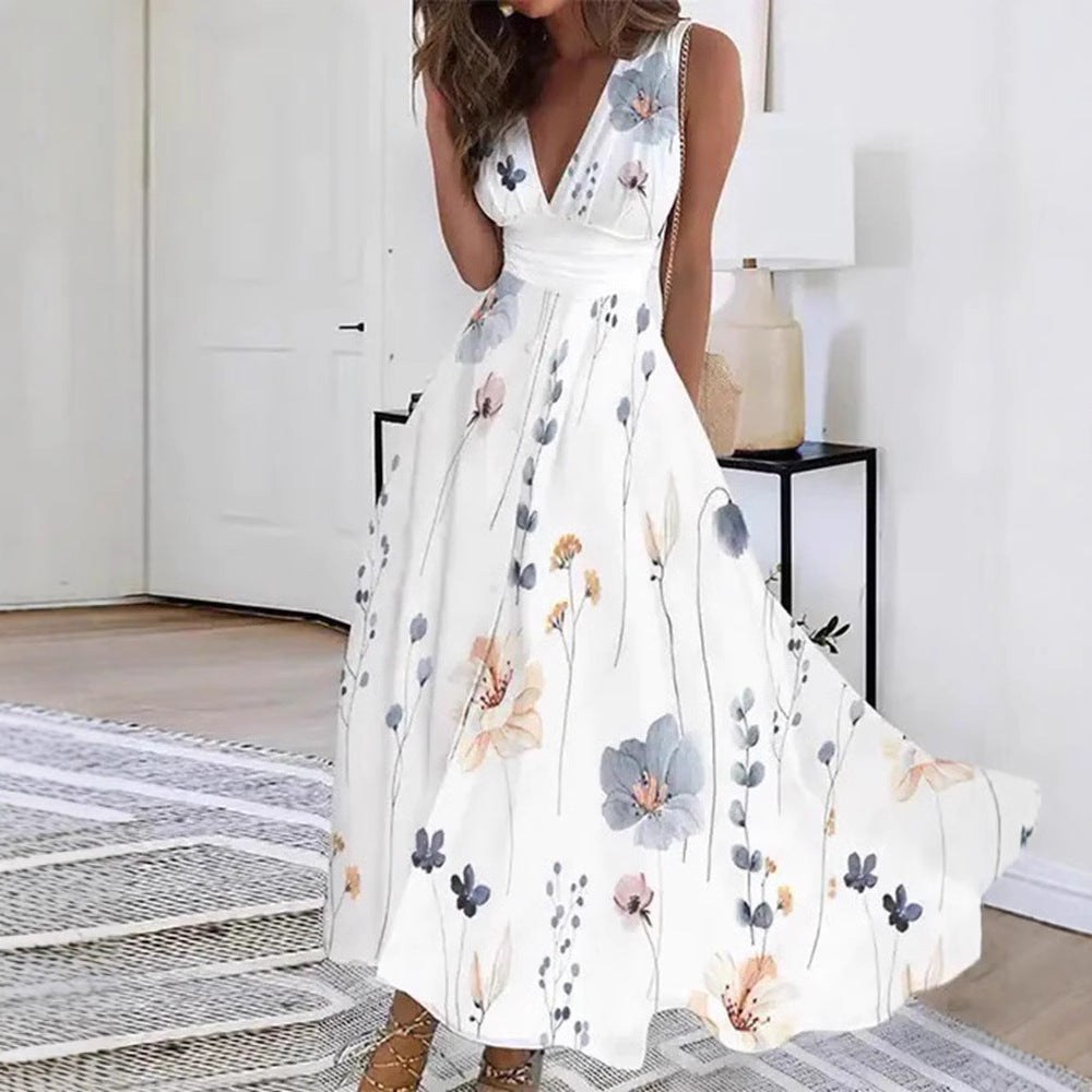 Women's flared midi dress with deep V-neck, empire waist and delicate floral print Mune Fashion