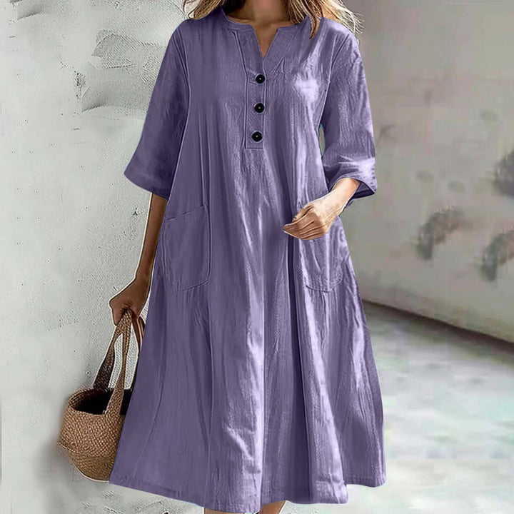 Women's casual falling A-line dress with V-neck button placket, 3/4 sleeves and patch pockets Mune Fashion