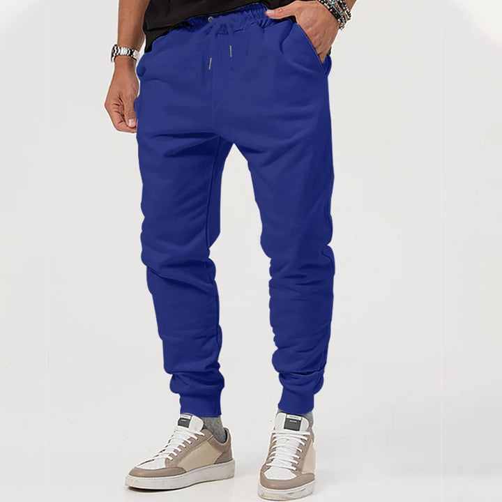 Men's jersey sweatpants in a tapered cut with concealed drawstring and shape-stable ankle cuffs Mune Fashion