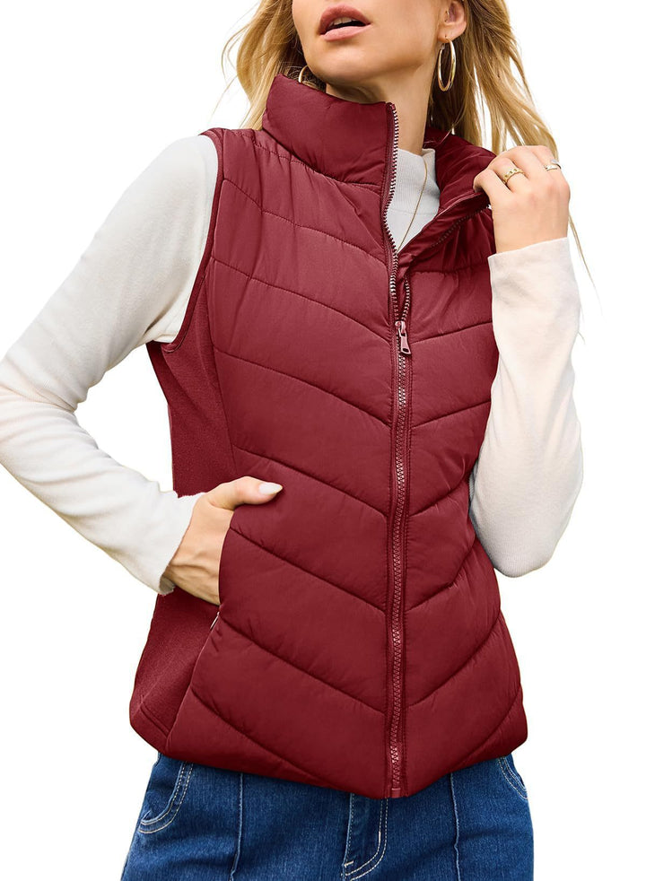Women's quilted thermo vest with high stand-up collar and elastic side inserts Mune Fashion
