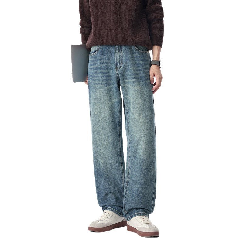 Men's baggy jeans made of heavy denim with a light used finish and a low crotch.