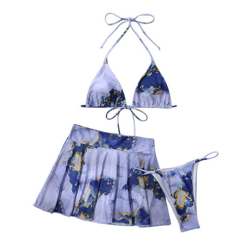Women's bikini set with creative wrap design and floral skirt Mune Fashion