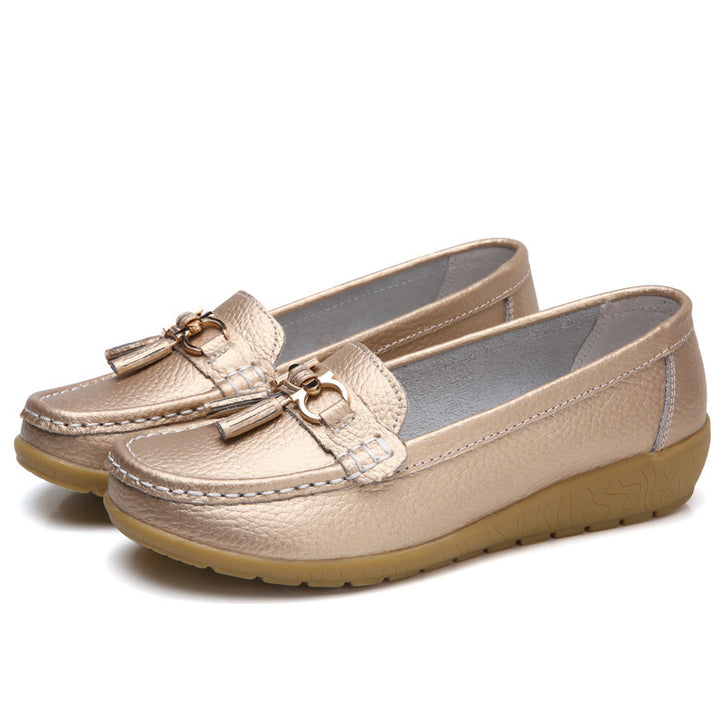 Women's classic tassel moccasin made of textured synthetic leather with padded comfort insole and flexible wedge sole Mune Fashion