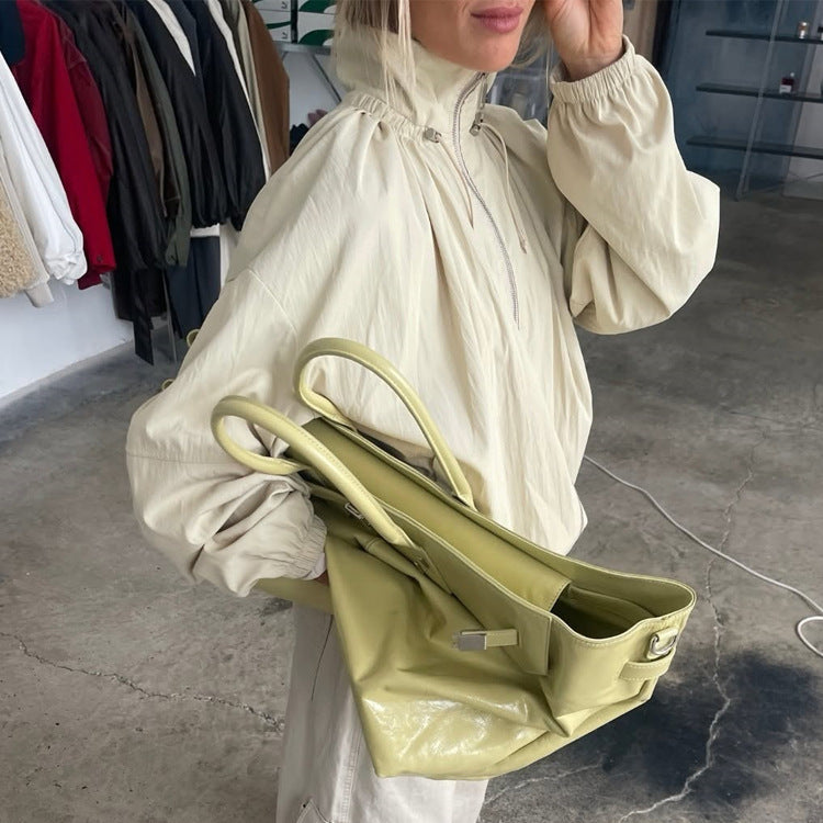 Women's Oversize Windbreaker with high stand-up collar, drawstring shoulder yoke, and balloon sleeves Mune Fashion
