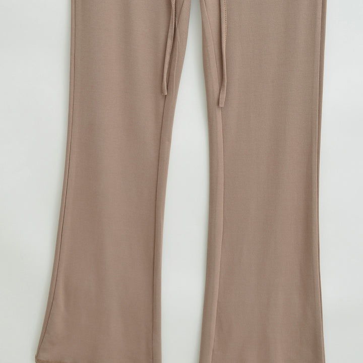 Women's Flowing Jersey Pants with High Waist, Drawstring and Flared Leg Mune Fashion