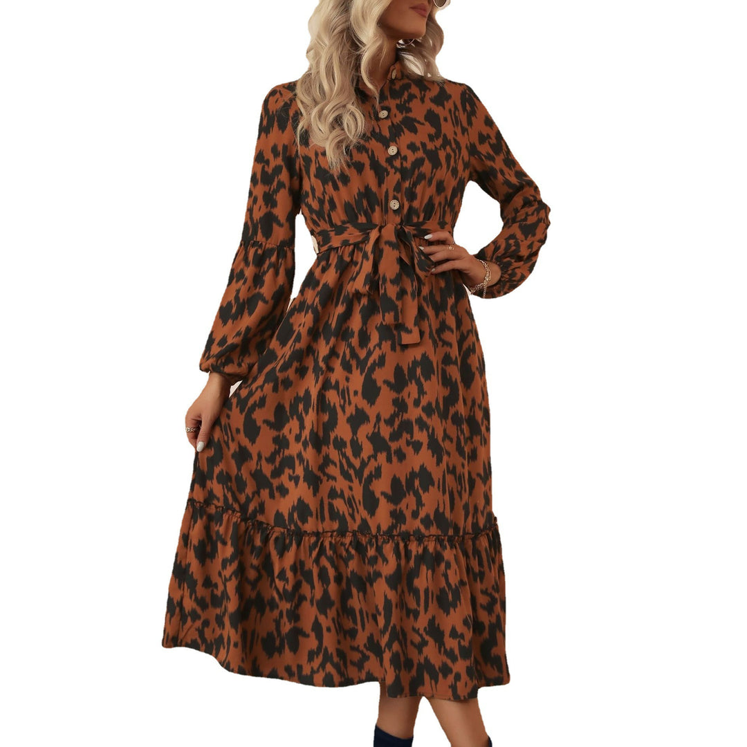 Women’s midi dress with animal print, button placket, waist belt and tiered skirt Mune Fashion