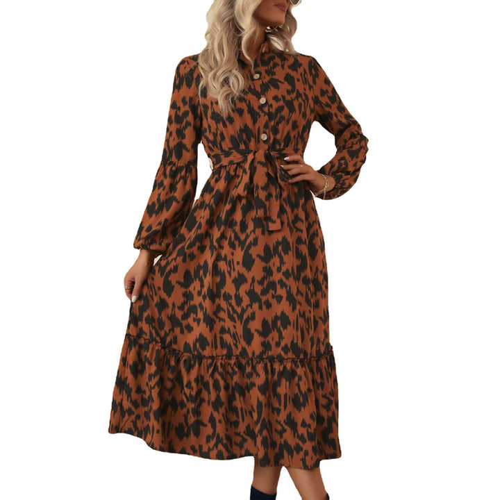 Women’s midi dress with animal print, button placket, waist belt and tiered skirt Mune Fashion