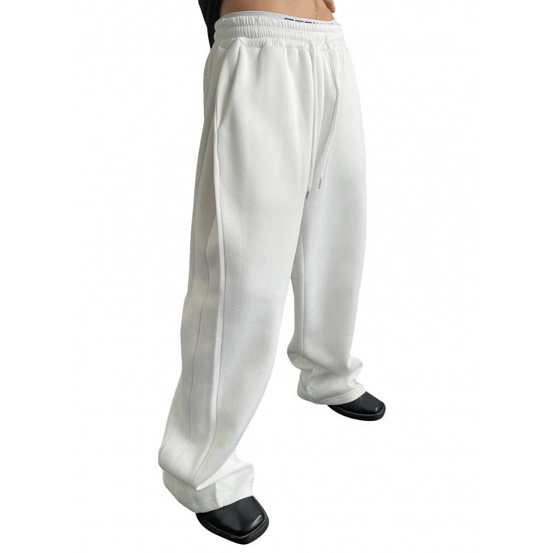 Women's wide oversize jogging pants with a deep crotch, elastic waistband, and drawstring Mune Fashion