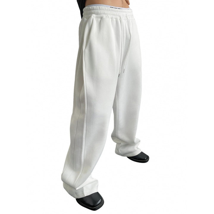 Women's wide oversize jogging pants with a deep crotch, elastic waistband, and drawstring Mune Fashion