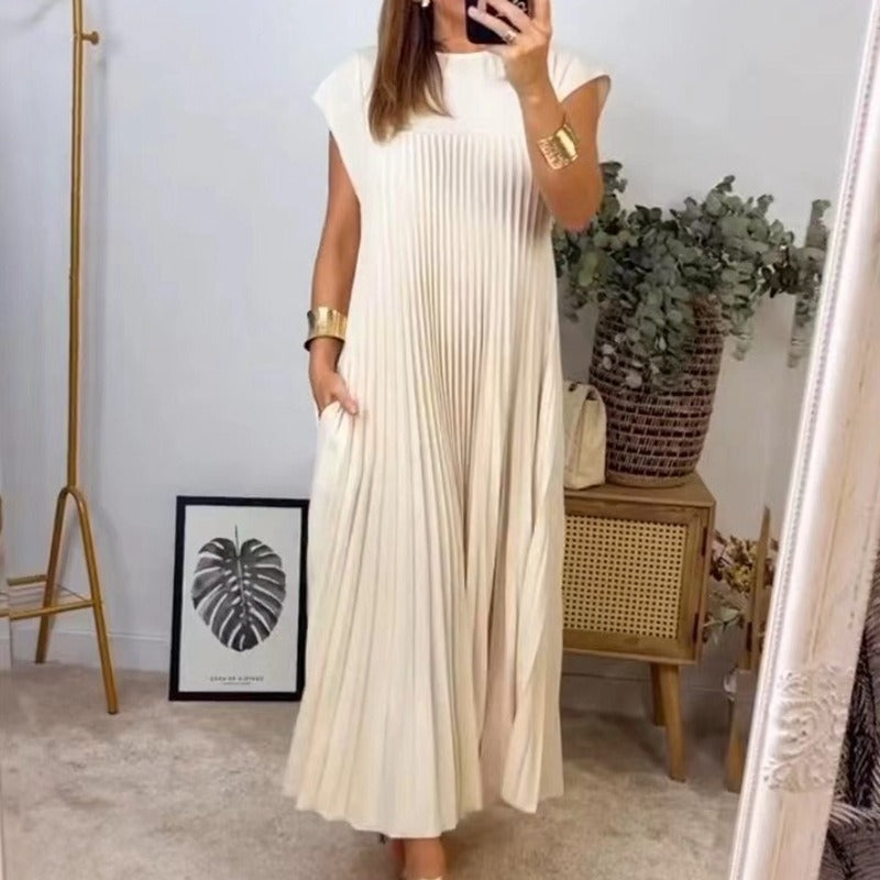 Women's flowing pleated maxi dress with dropped shoulders and side pockets Mune Fashion