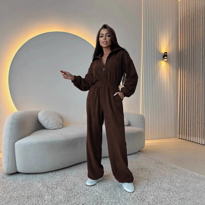 Women's elegant lounge overall with elastic waistband, stand collar, zipper and wide leg.