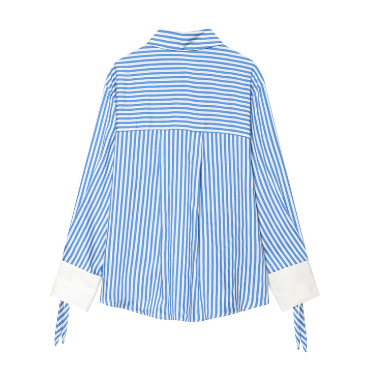 Women's oversized shirt blouse with Kent collar, continuous button placket, distinctive cuffs with lace detail and fine striped pattern Mune Fashion