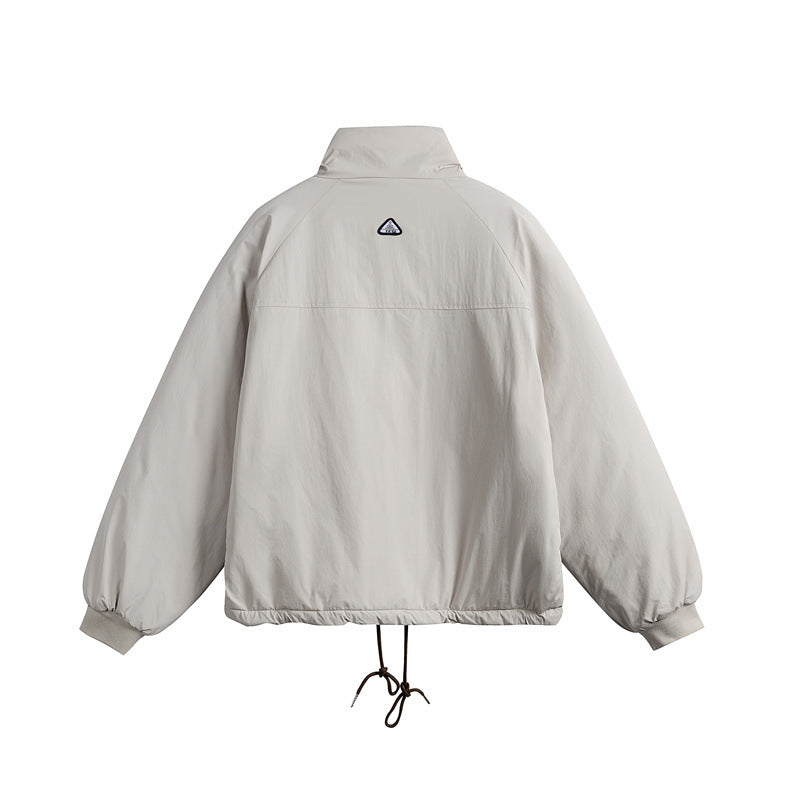 Unisex Short cut boxy padded jacket with drawstring and raglan sleeves Mune Fashion
