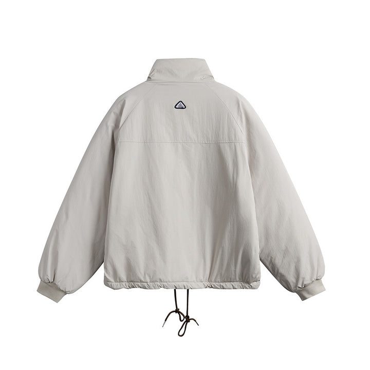 Unisex Short cut boxy padded jacket with drawstring and raglan sleeves Mune Fashion