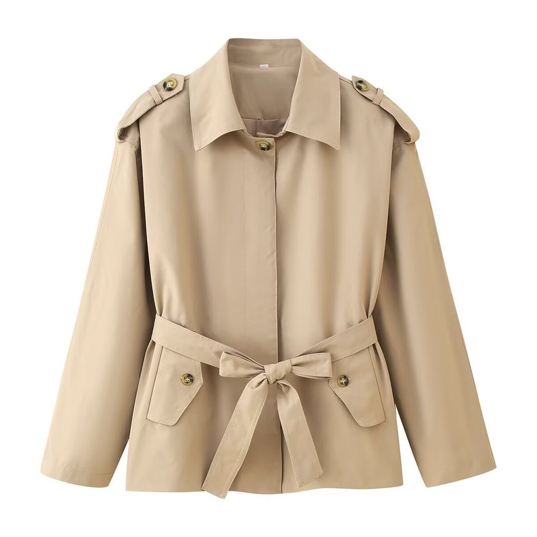 Women's short trench coat with waist belt, shoulder flaps, and patch pockets Mune Fashion