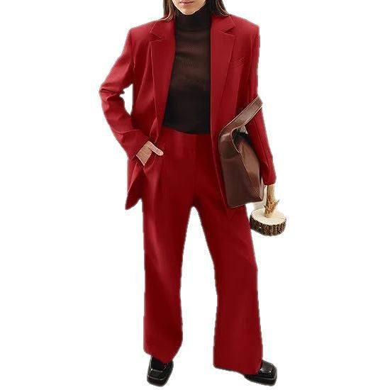 Women Long Blazer Set with boxy oversized silhouette, structured shoulder area and high-waisted palazzo pants Mune Fashion