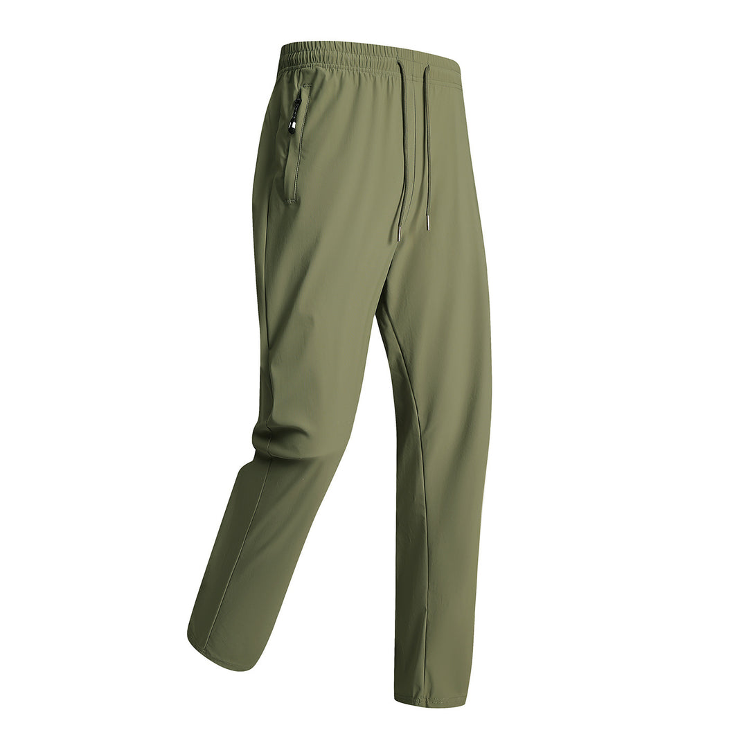 Men's sporty training pants with elastic waistband and zippered pockets Mune Fashion