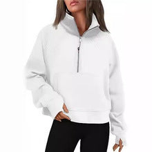Ladies oversized short pullover with stand-up collar, half zipper and kangaroo pocket Mune Fashion