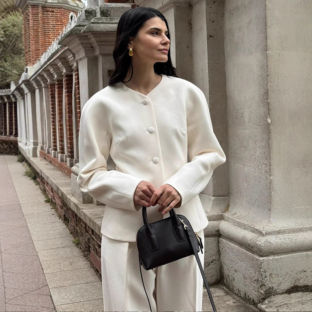 Women Short Blazer with Sculptural Shoulder, Rounded Neckline and Concealed Button Placket Mune Fashion