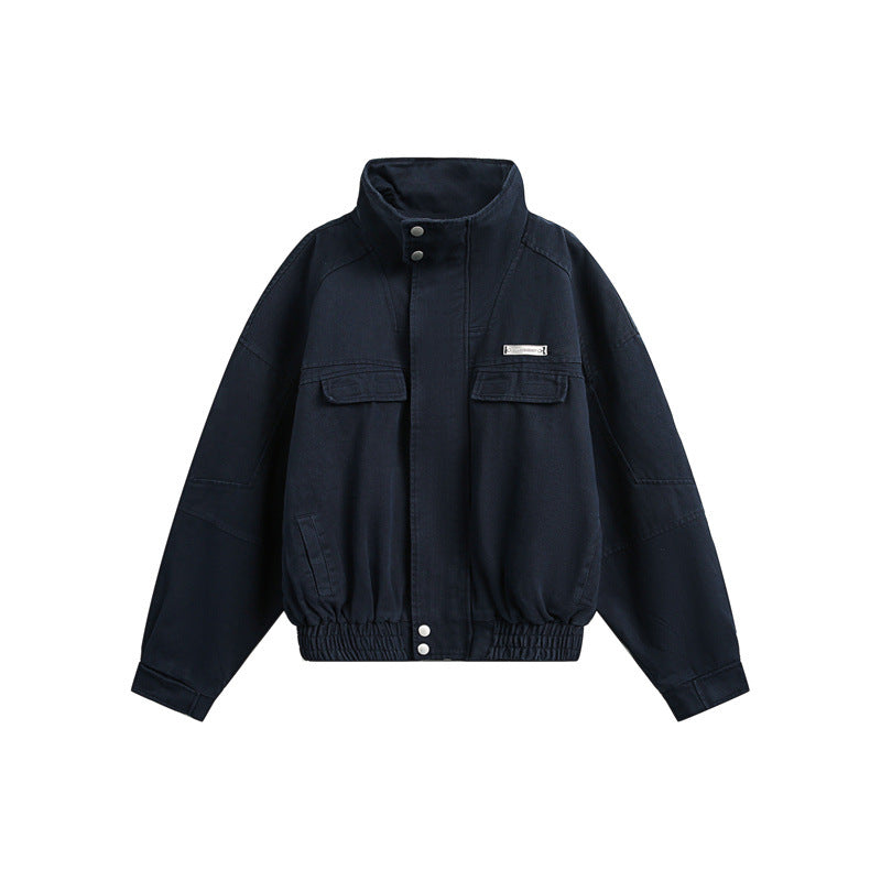 Unisex Short cut Boxy outdoor jacket with concealed zipper placket, high stand-up collar and elastic waistband Mune Fashion