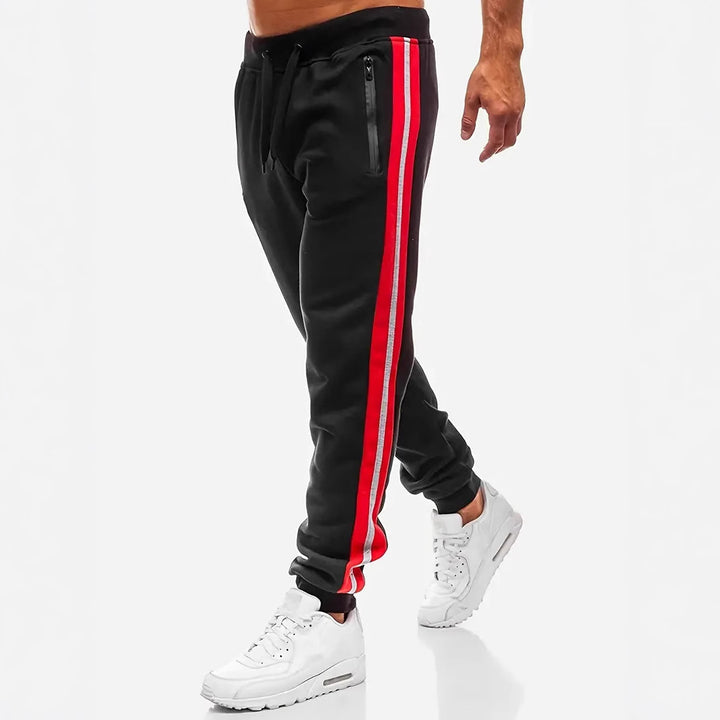 Men's narrow tapered fleece jogging pants with two-tone side piping and water-repellent zip pockets Mune Fashion