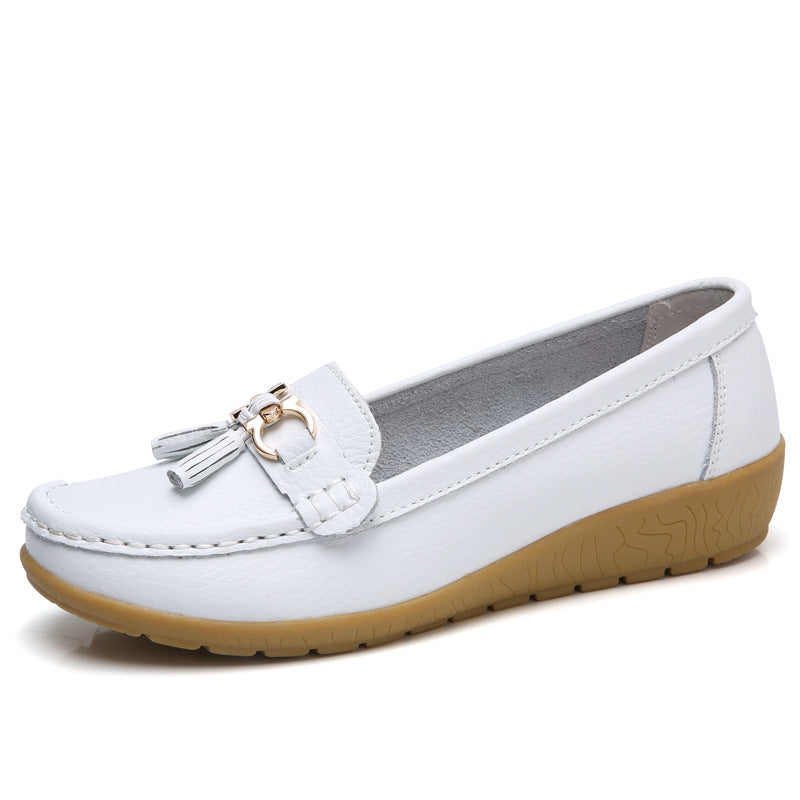Women's classic tassel moccasin made of textured synthetic leather with padded comfort insole and flexible wedge sole Mune Fashion