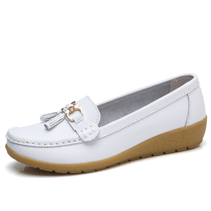 Women's classic tassel moccasin made of textured synthetic leather with padded comfort insole and flexible wedge sole Mune Fashion